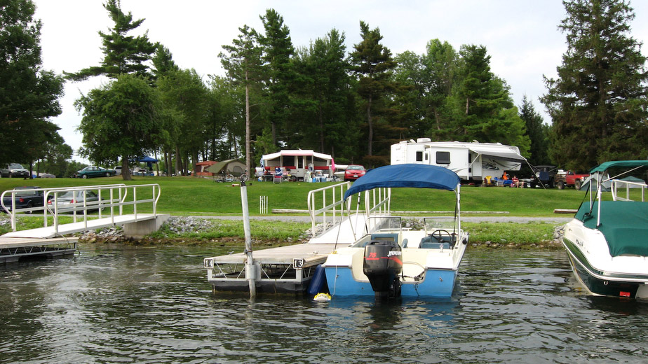 Grass Point State Park is on a point of land that projects into the American Channel of the St. Lawrence River, known for some of the best fishing in the country. The park is a popular spot for campers and day-users, who come to boat, swim, fish, picnic, or just to relax. There is a marina and boat launch, an area is available for games, and the sandy beach and shallow water are excellent for children.Located on the west side of the beach is the Grass Point cottage, a full service accommodation. The two-story cottage has a bathroom with shower, kitchen with refrigerator, stove, microwave, cooking and eating utensils. Bedding, pillows and linen are also provided. The screened-in porch has some outstanding views of the river and sunsets.