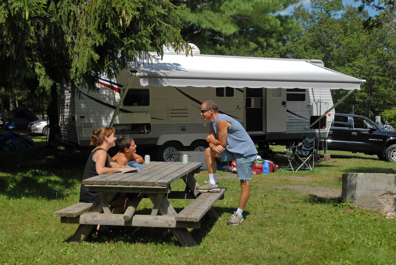 Thompson's Lake State Park, nestled in the mountains just four miles from the Helderberg Escarpment, is a popular camping ground and recreation area. In addition to 140 wooded campsites, the park comprises a sandy beach, mixed hardwood and conifer forests, limestone outcroppings and open fields. Recreational opportunities include a volleyball court, horseshoe pits, a playing field, swingsets, carry-in boat access, rental row boats, fishing areas, and nature trails. Interpretive and recreational programs are offered for campers throughout the summer. During the winter, visitors can cross-country ski and ice fish.